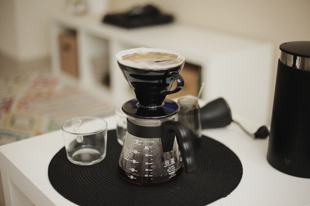 a coffee maker sitting on top of a counter