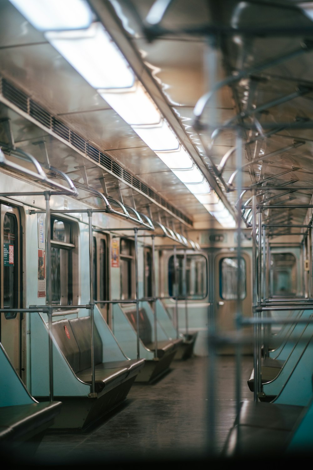 an empty subway car with no passengers on it