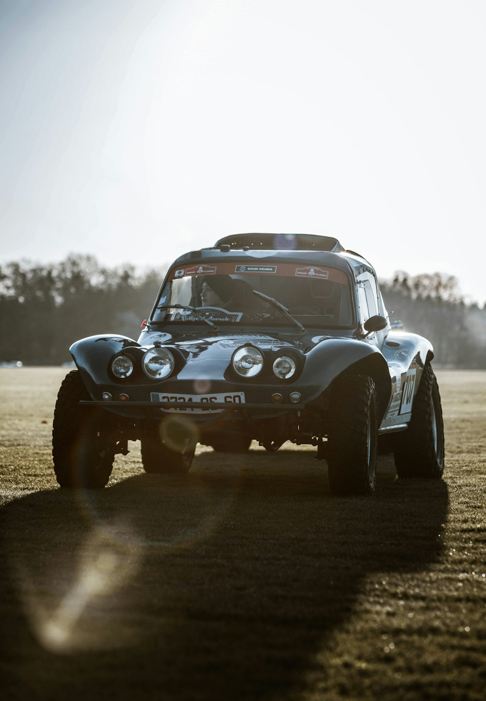 a car that is sitting in the dirt