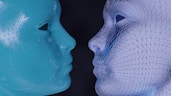 a blue and a white mannequin face to face