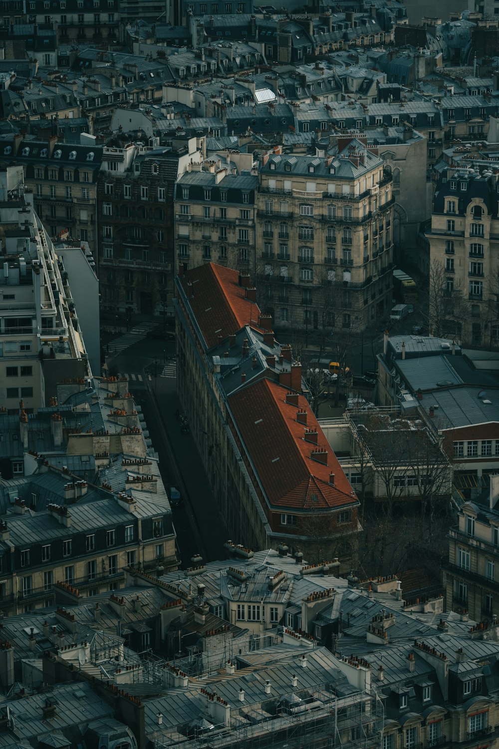 an aerial view of a city with tall buildings