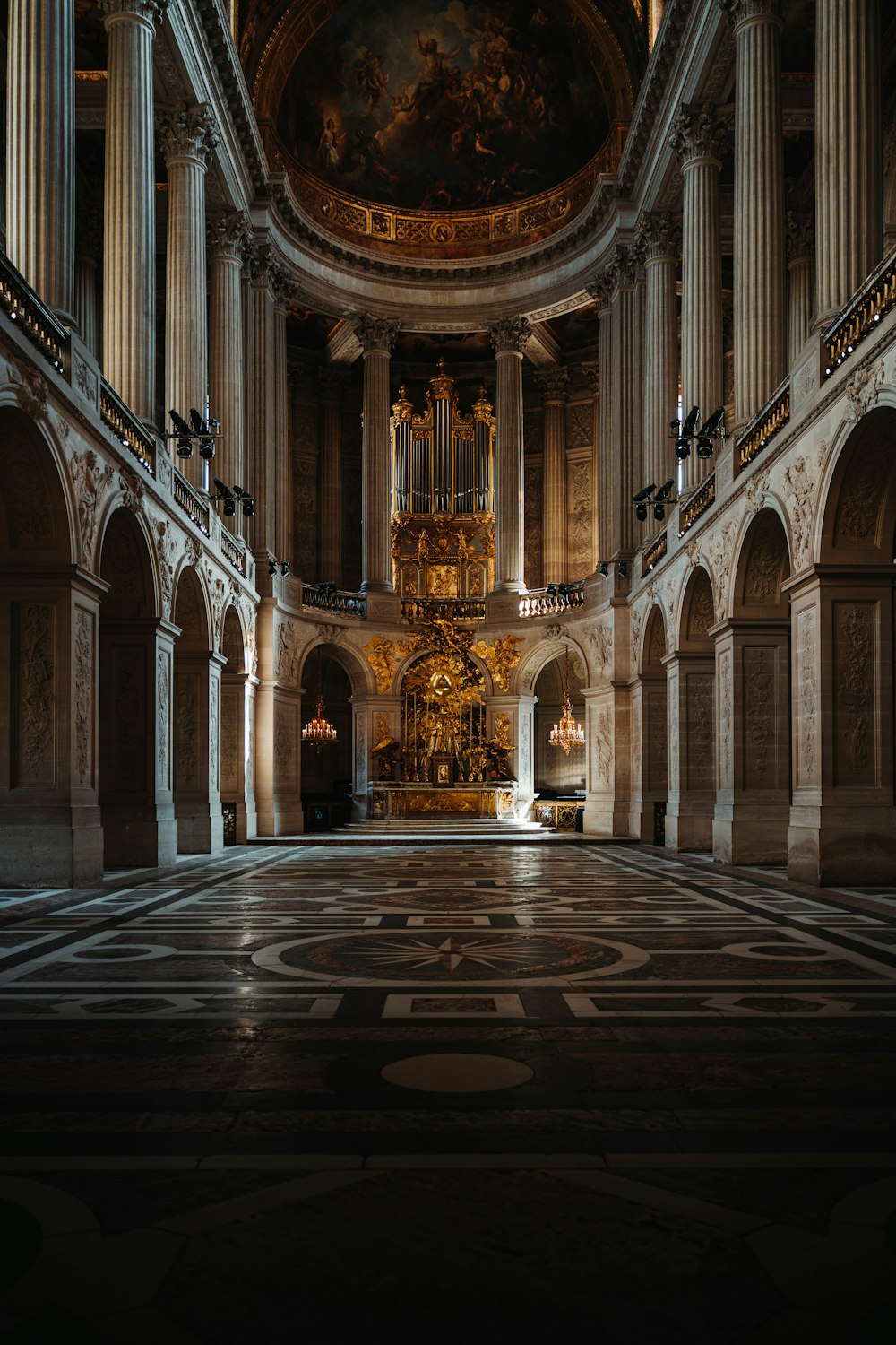 a large room with a large ceiling and a clock on the wall