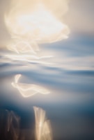 Softly blurred image of flowing fabric in muted tones, evoking the gentle rhythm of a mindful daily routine.