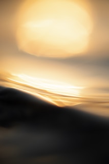 A romantic, dreamlike vista with soft edges and a luminous palette capturing inner experience.