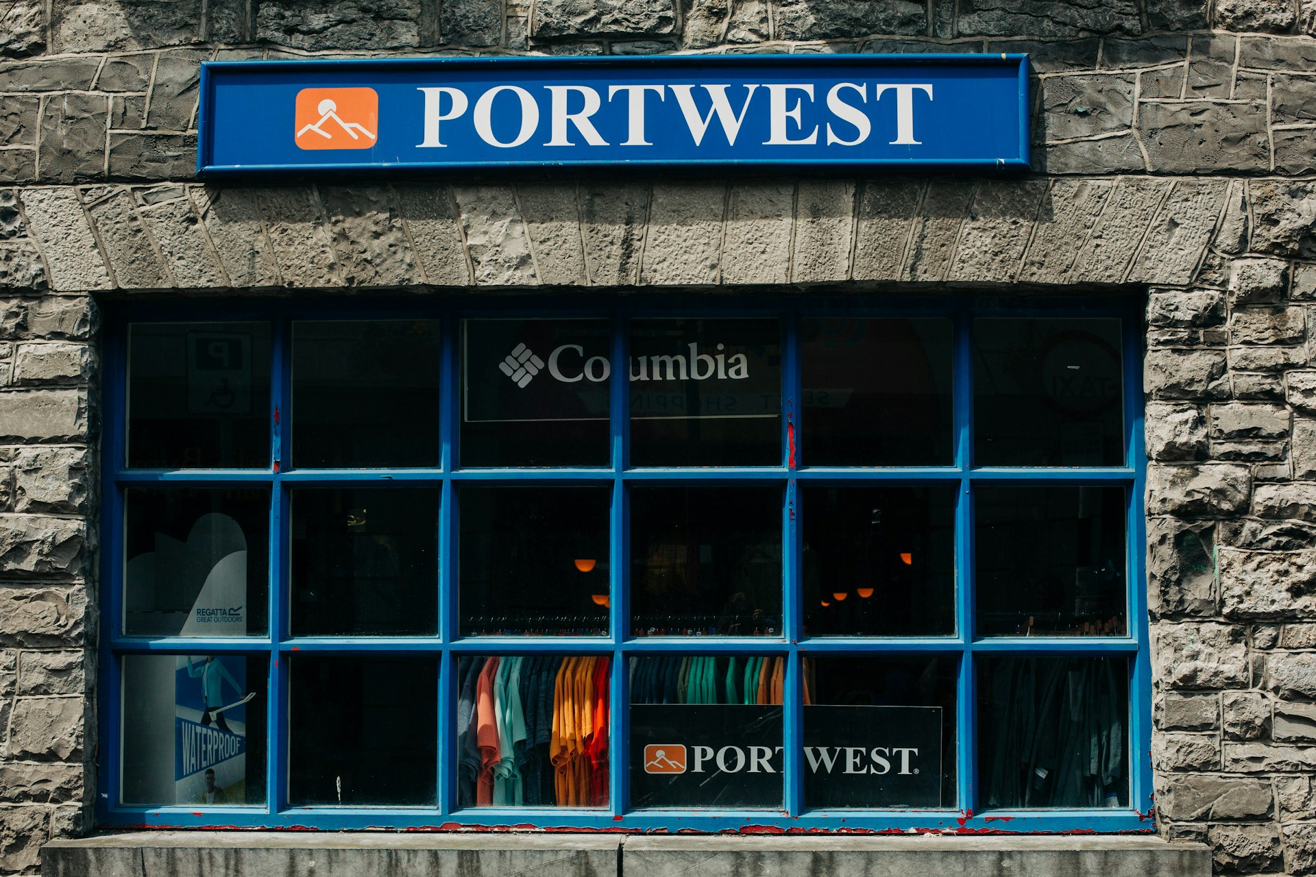 woman wearing yellow long-sleeved dress under white clouds and blue sky during daytime