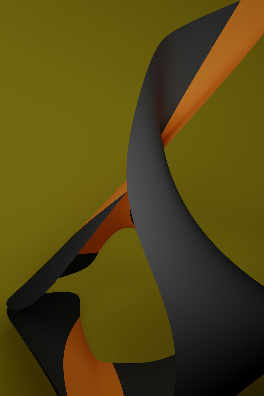 a black and orange curved object on a green background