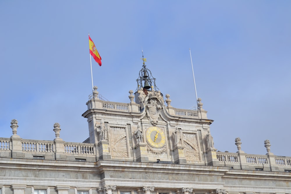 a large building with a clock on the front of it