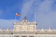 a large building with a flag on top of it