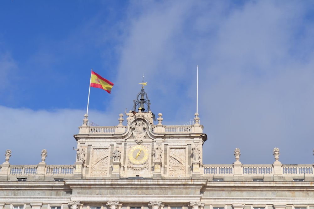 a large building with a flag on top of it