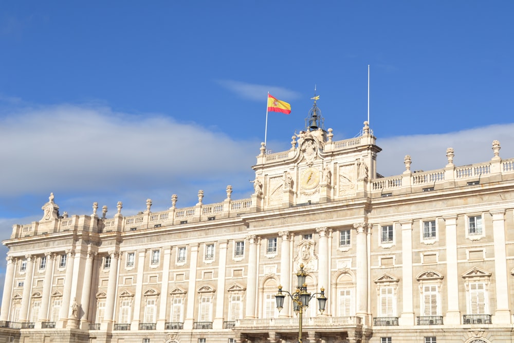 a large building with a flag on top of it