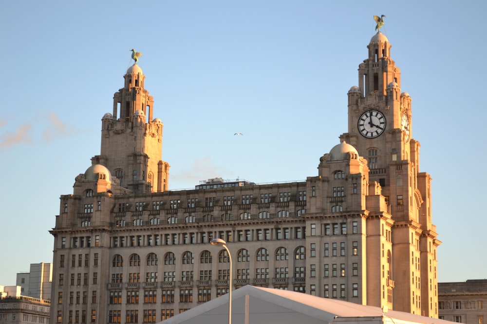 a large building with a clock on the top of it