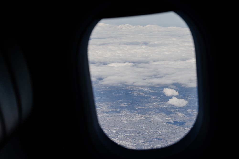 a view of the clouds from an airplane window