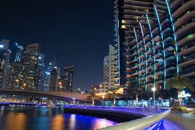 a view of a city at night from across the river