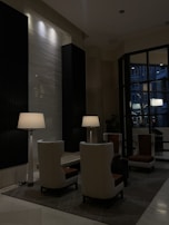 A cozy lounge area with elegant decor and soft lighting.