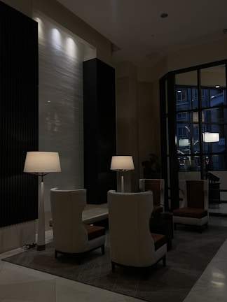 A quiet lounge area with comfortable seating and warm ambient lighting.