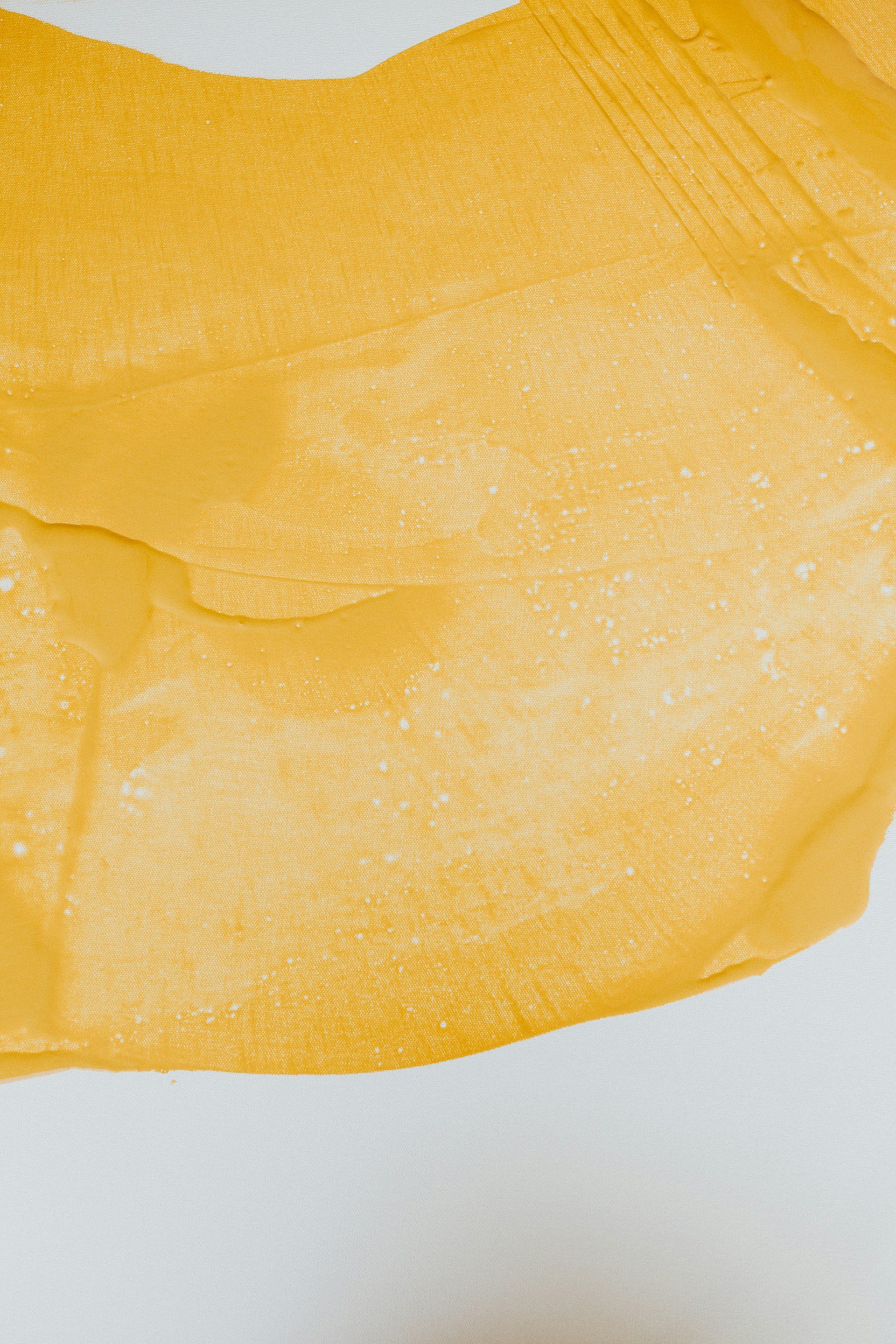 a yellow cloth hanging from a clothes line