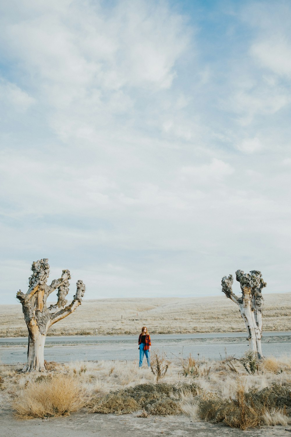 a person standing in front of a body of water