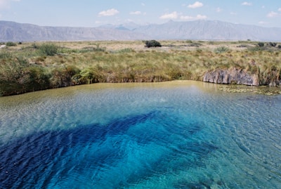A serene view of the Caucasus mountains where badamlı’s natural mineral water source is located.