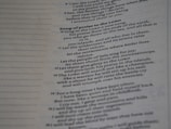 Text from a religious book printed on a page, focusing on a section titled 'Song of praise to the Lord'. It includes verses with poetic language praising divine qualities and actions.