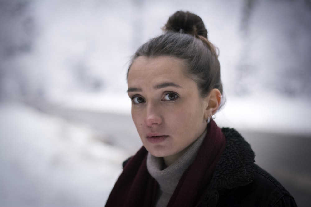 a woman with a bun in her hair