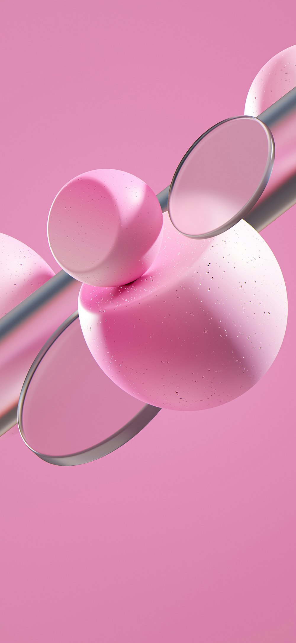 a close up of a pink object on a pink background