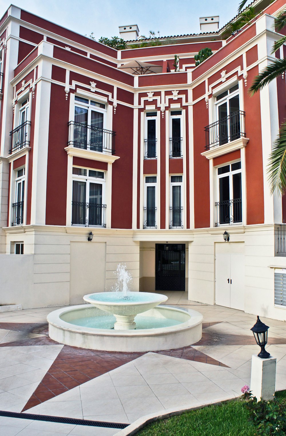 a building with a fountain in front of it