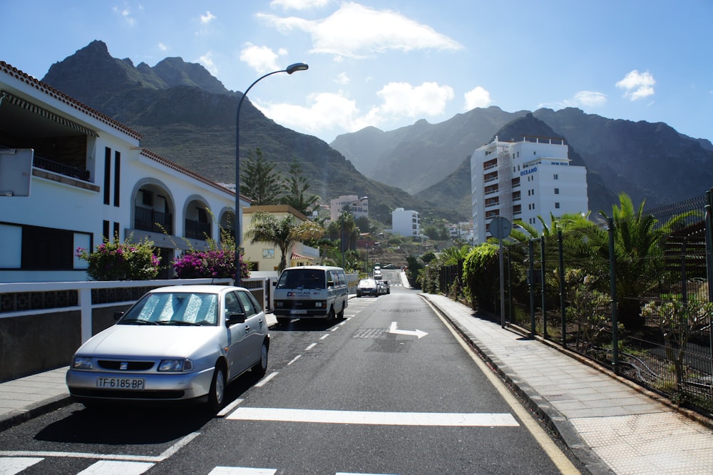 cars are parked on the side of the road