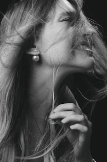 Portrait of a joyful woman celebrating her recovery and strength.