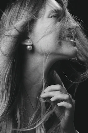 Portrait of a joyful woman celebrating her recovery and strength.