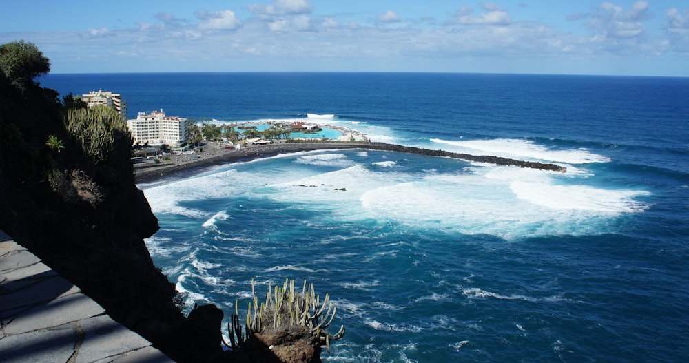 a large body of water next to a beach