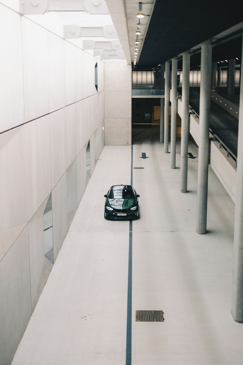 a car is parked in a parking garage