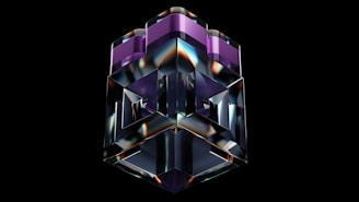 A 3D geometric sculpture with a glossy, reflective surface is centered against a black background. The structure features complex shapes with sharp edges and consists of transparent and purple-tinted sections.