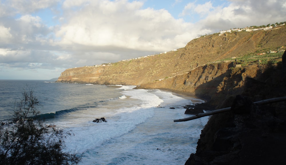 a view of the ocean from a cliff