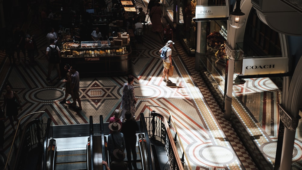 a group of people walking up and down a set of stairs