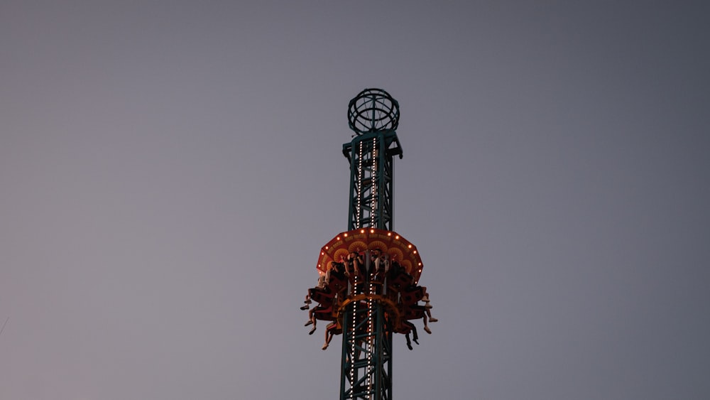 a tall tower with a clock on top of it