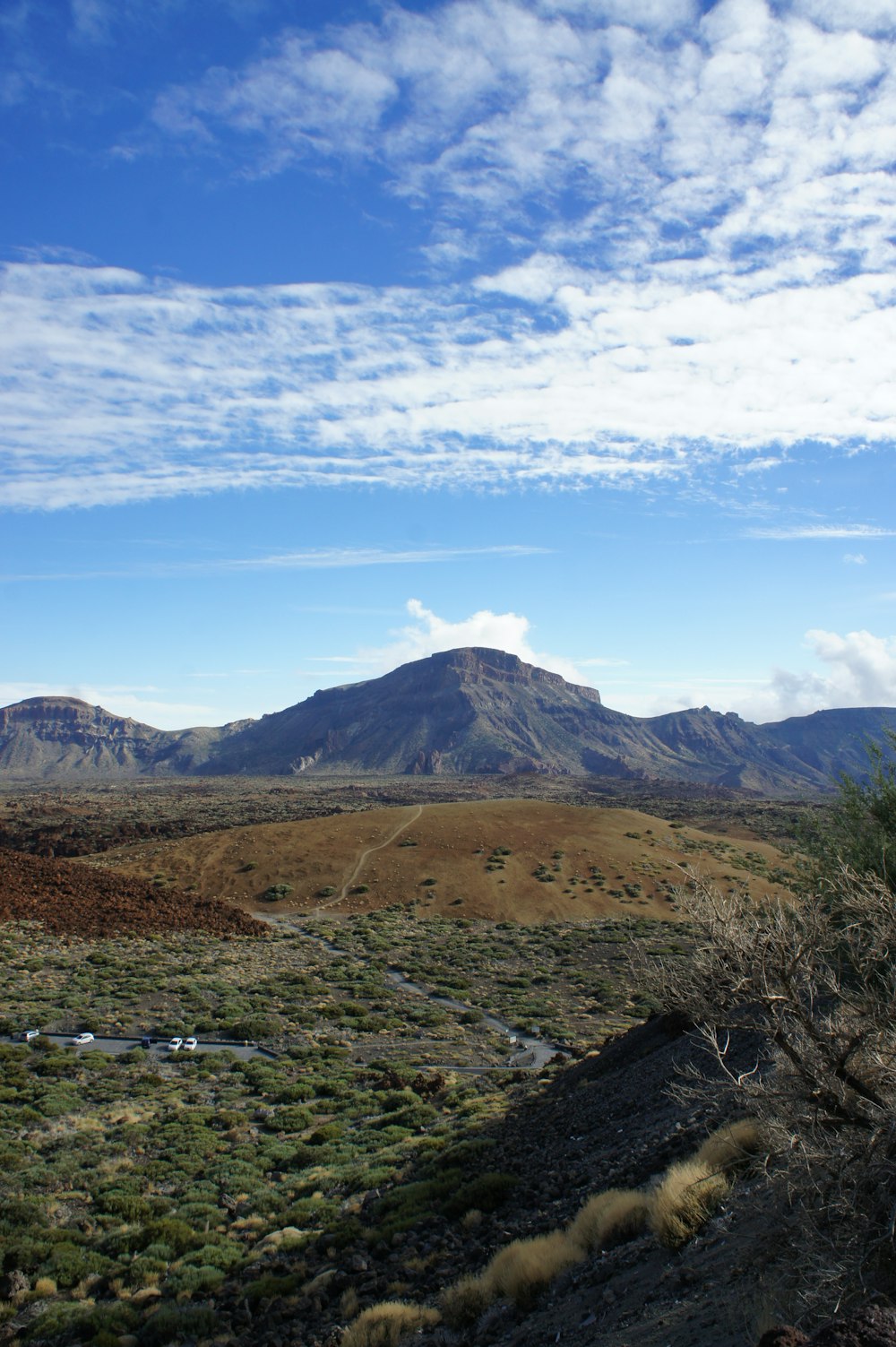 a view of a mountain range with a river running through it