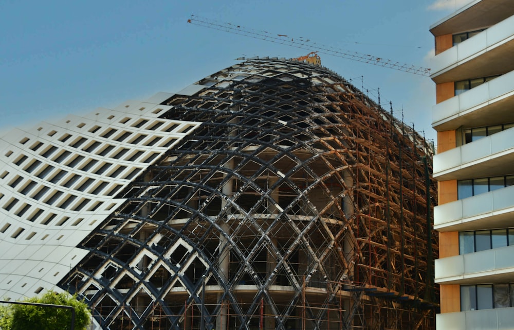 a large building with scaffolding on the side of it