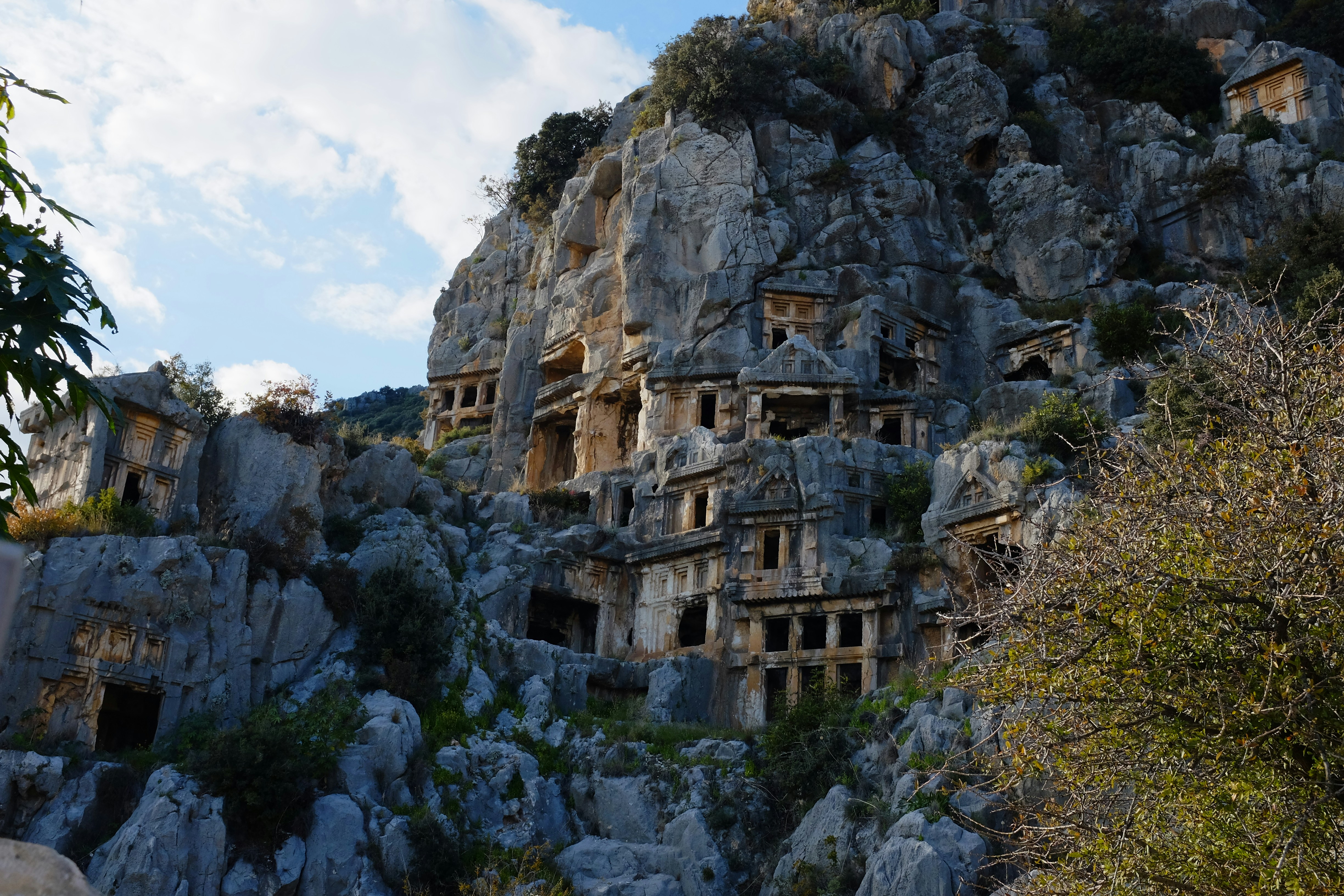 Cliffside houses built into rocky terrain