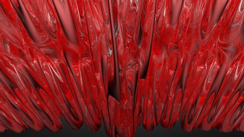 Acrylic trivet with bold black and white fluid patterns resting on a wooden surface.