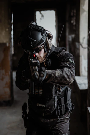 An instructor demonstrating tactical communication techniques during a hands-on training exercise.