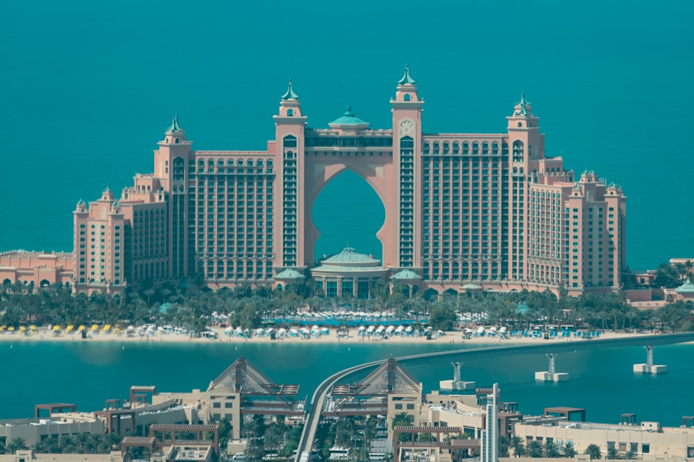 a view of a very large building in the middle of the ocean