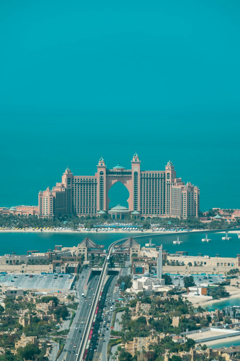 a view of a city with a large building in the background