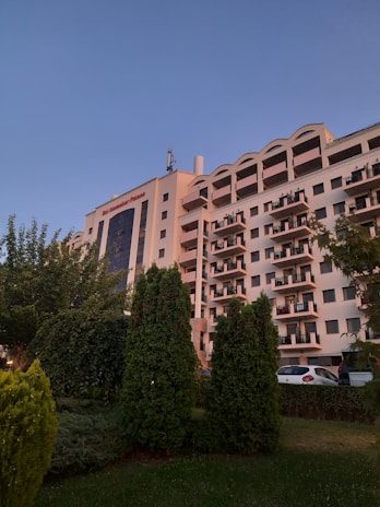 Exterior shot of the now residence carapicuiba building at sunset