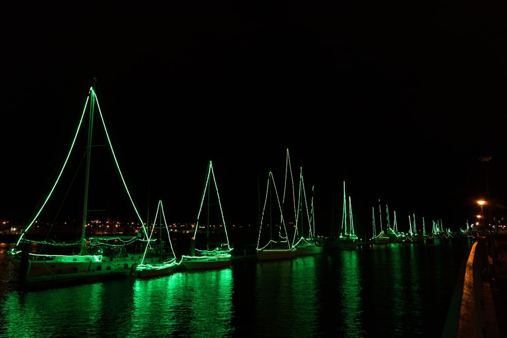 a group of boats that are sitting in the water