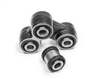 A close-up of metal mechanical components consisting of multiple rubber bushings. The bushings are primarily black with a metallic silver inner ring and are set against a plain white background.