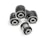 A close-up of metal mechanical components consisting of multiple rubber bushings. The bushings are primarily black with a metallic silver inner ring and are set against a plain white background.