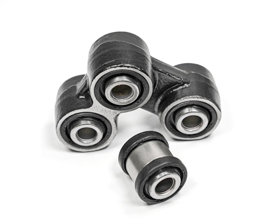 Photo of Oda Autoparts factory with workers assembling bushings