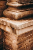 Close-up of architectural details showing textured stone and brickwork.