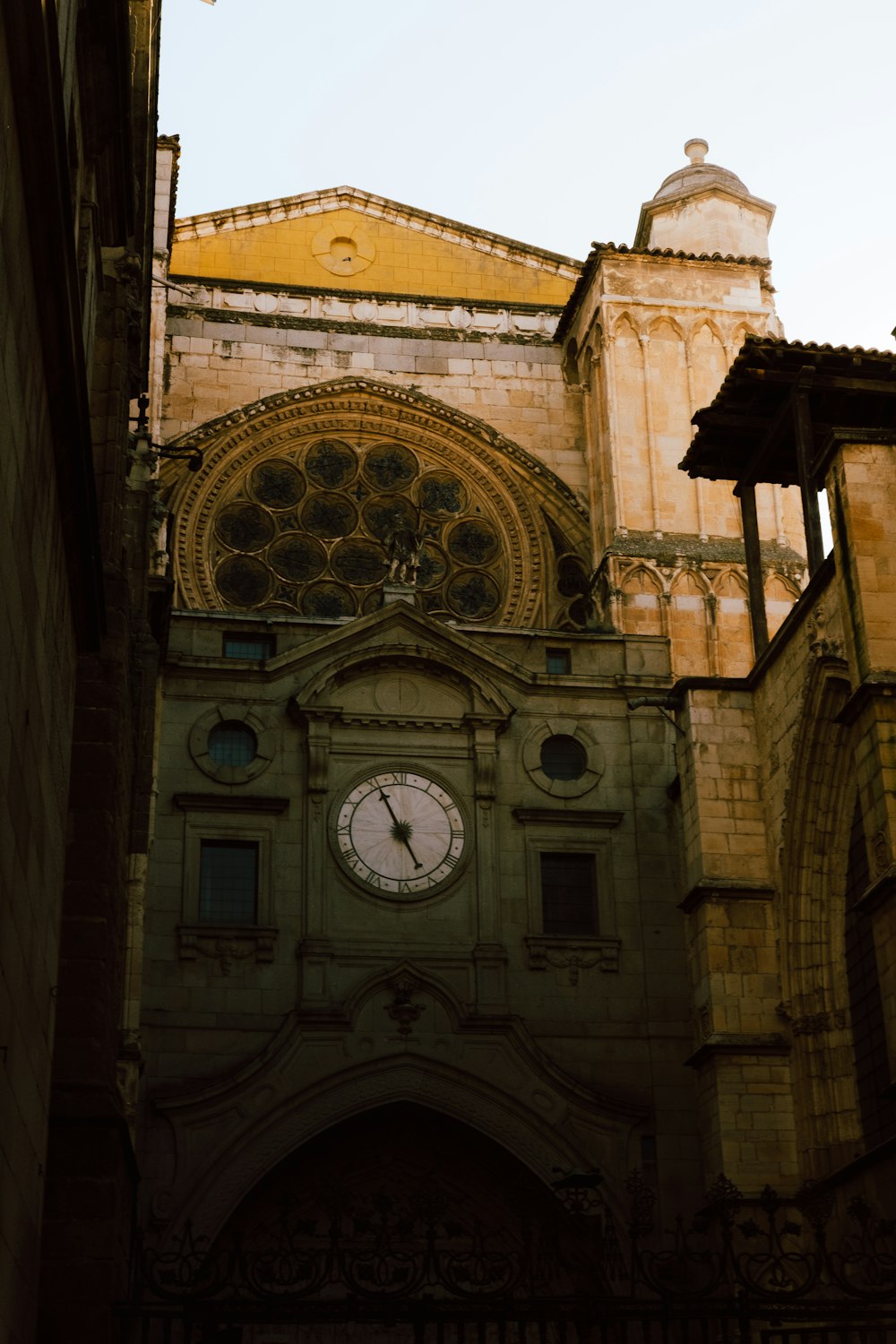 a large building with a clock on the front of it