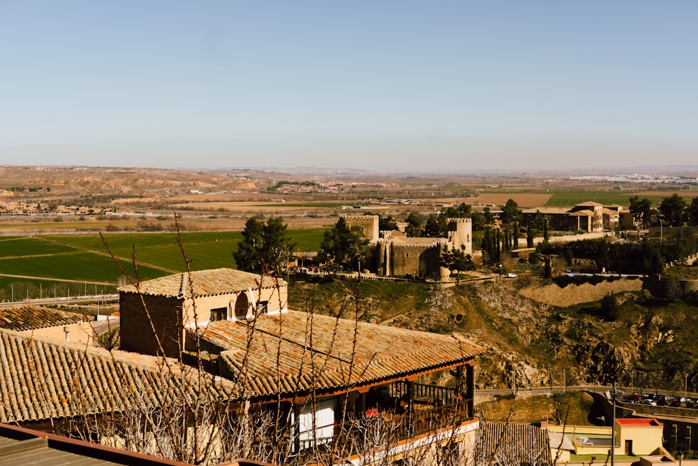a view of a village from a hill